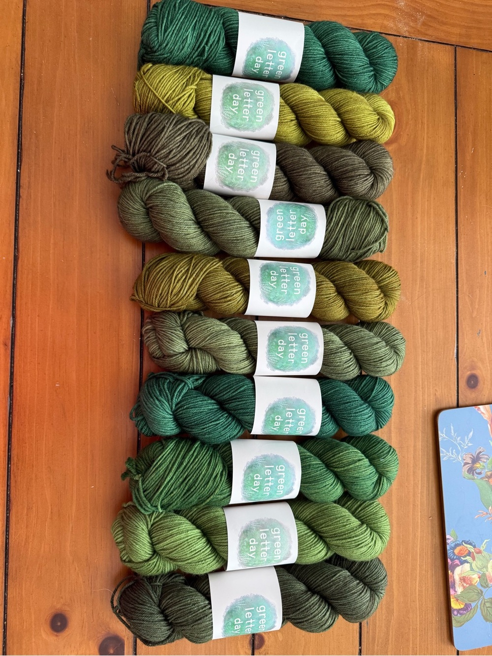 Green letter day 10 skeins of yarn